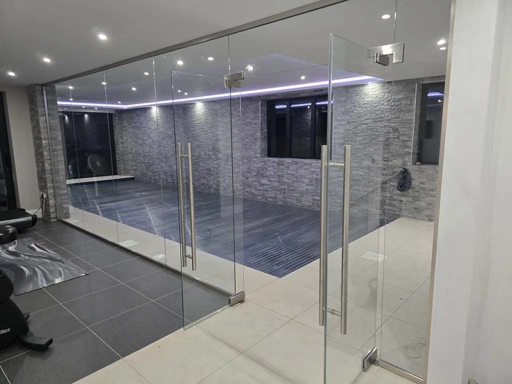 Glass Partition Between Gym & Pool